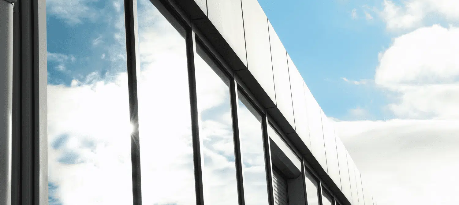 Flat glass window tinting applied to residential windows