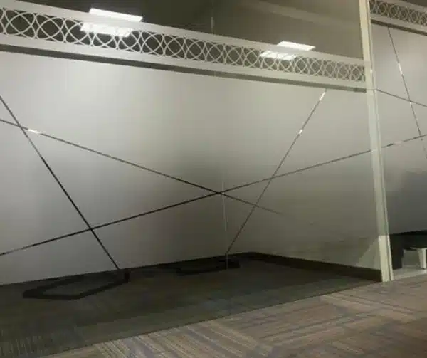 Decorative frosted window film on commercial office glass for privacy and branding