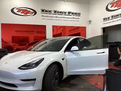 White Tesla Model 3 window tinting completed by The Tint Pros in Orange County
