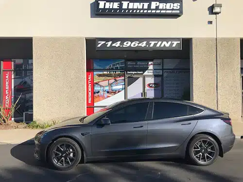 Grey Tesla Model Y with ceramic window tinting by The Tint Pros in Orange County