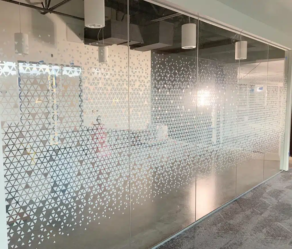 Customized residential and commercial glass with custom printed graphic window film by The Tint Pros