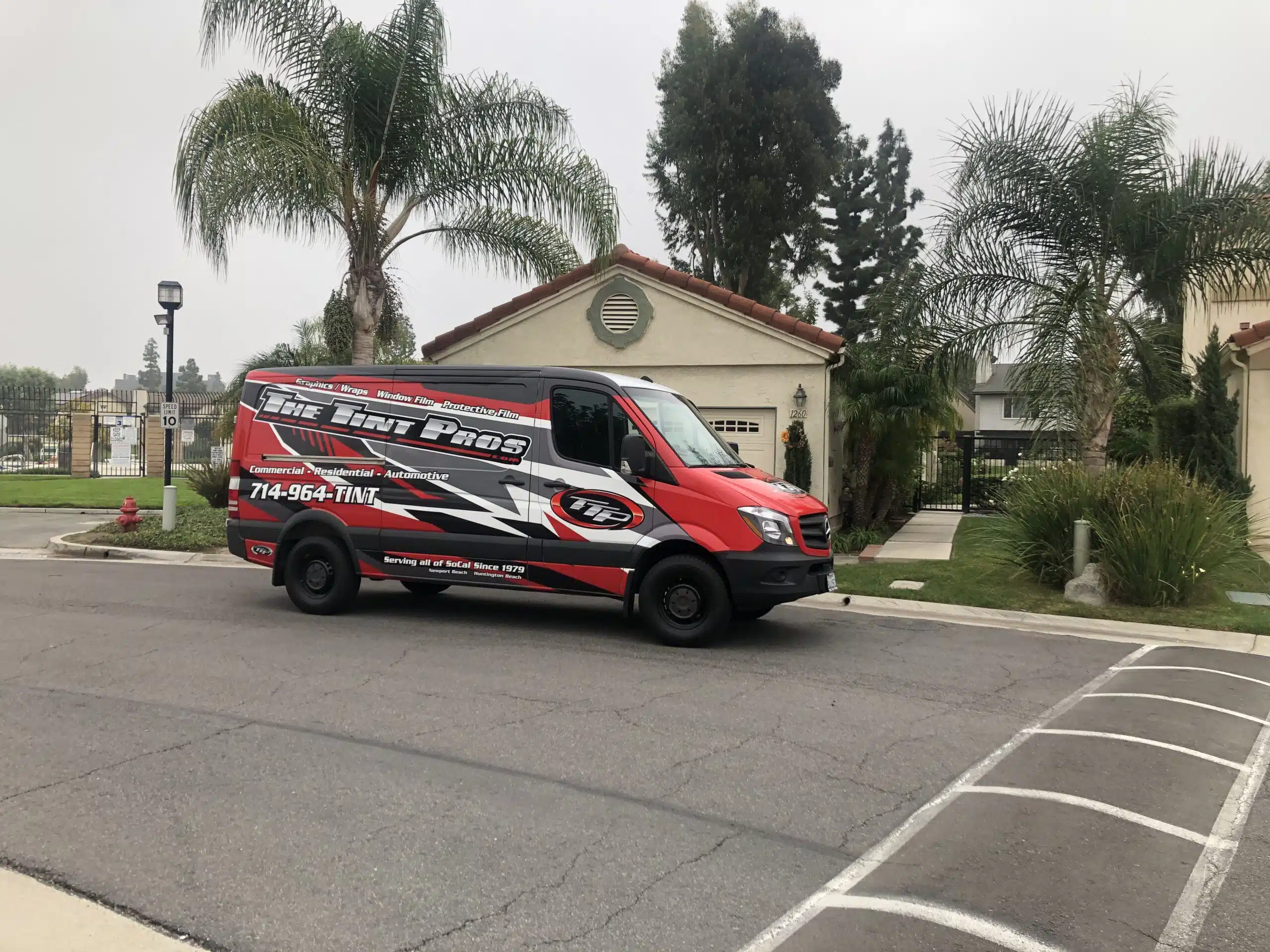 The Tint Pros branded business van serving window tinting customers in Newport Beach and Laguna Beach