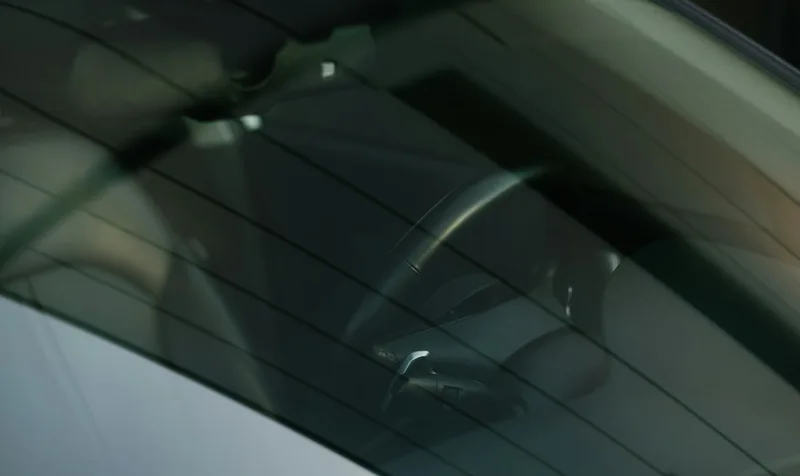 Close-up of a car rear window with ceramic tint film, illustrating premium window tint film quality