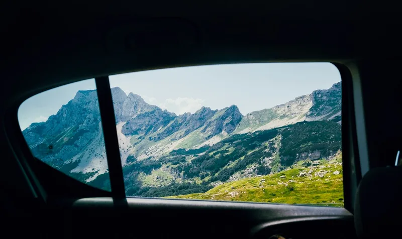 View through a tinted car window showing how window tint shade percentages affect visibility and light