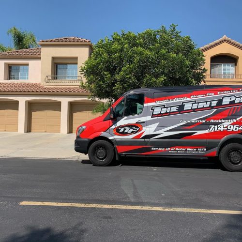 The Tint Pros branded business van promoting window tinting services in Huntington Beach and Costa Mesa, Orange County