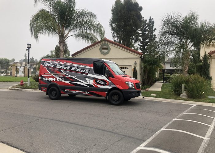 The Tint Pros branded business van serving window tinting customers in Newport Beach and Laguna Beach
